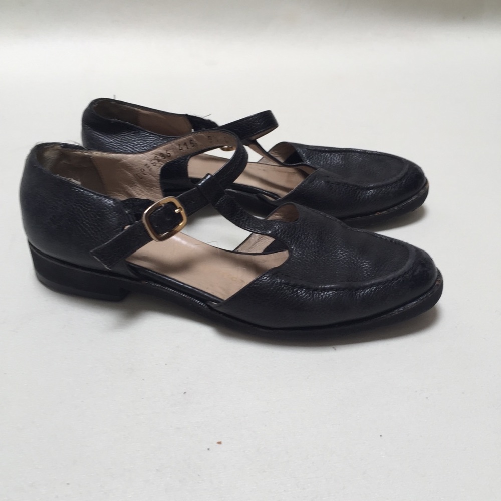 Ferragamo T-Strap flats with gold-toned buckles
